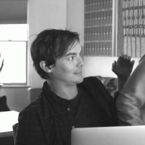 Man Sitting at Laptop