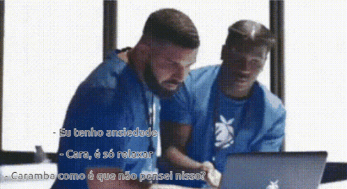 Man Sitting at Laptop Saying Eu Tenho Ansiedade