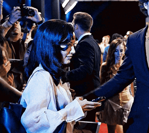 Man Sitting At Microphone Next To Spider-Man No Way Home Poster GIF