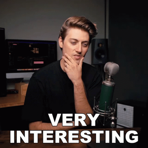 Man Sitting at Microphone Saying Very Interesting