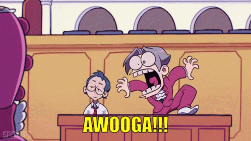 Man Sitting at Podium With Awooga