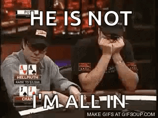 Man Sitting At Poker Table With Hands Folded GIF