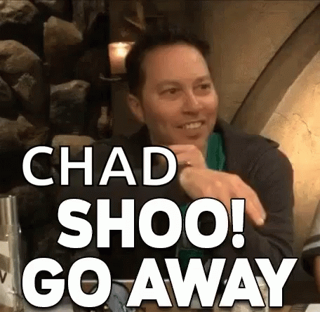 Man Sitting at Table Chad Shoo Go Away