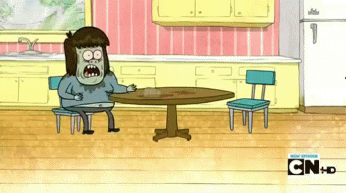 Man Sitting at Table cn hd