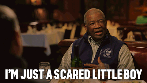 Man Sitting at Table Saying I'm Just a Scared Little Boy