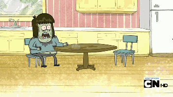 Man Sitting at Table with cn hd