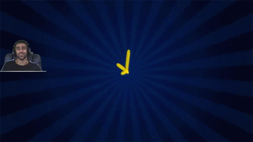 Man Sitting Before Blue And Yellow Starburst GIF