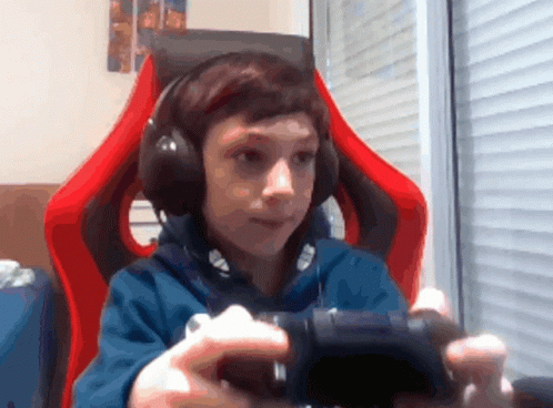 Man Sitting Cross-Legged on Phone