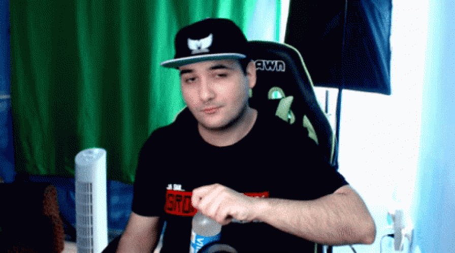 Man Sitting Drinking Water GIF