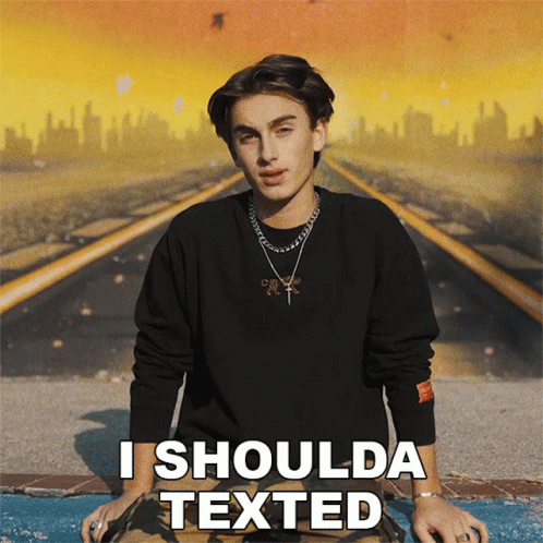 Man Sitting Ground Saying I Shoulda Texted