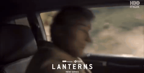 Man Sitting In Back Seat Looking Out Window GIF