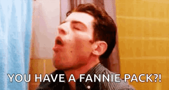 Man Sitting In Bathroom With Mouth Open GIF