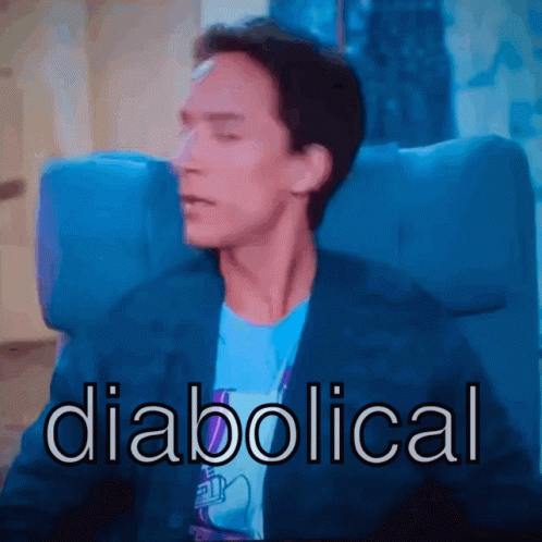 Man Sitting in Blue Chair Diabolical