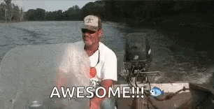Man Sitting in Boat on River