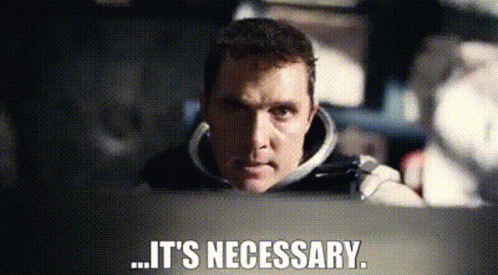 Man Sitting in Car Saying It's Necessary