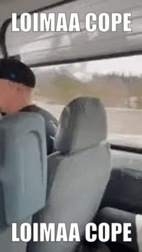 Man Sitting in Car Saying Loimaa Cope