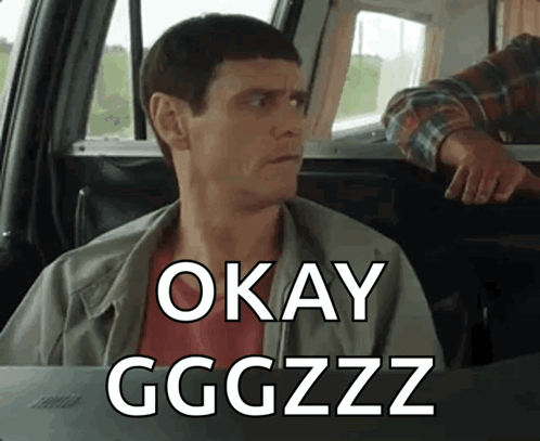 Man Sitting in Car Saying Okay Ggzzzz