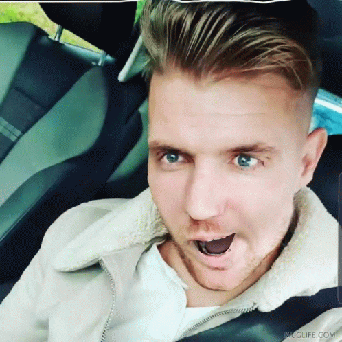 Man Sitting In Car With Mouth Open GIF
