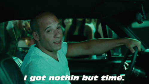 Man Sitting in Car with Nothin But Time