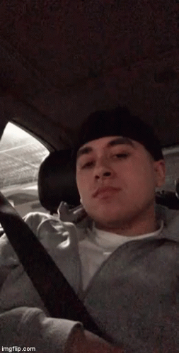 Man Sitting in Car With Seat Belt