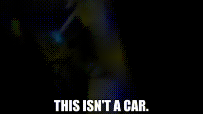 Man Sitting in Car With This Isn't a Car