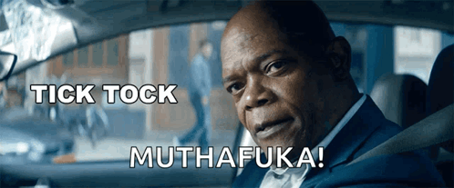 Man Sitting in Car with Tick Tock Muthafuka