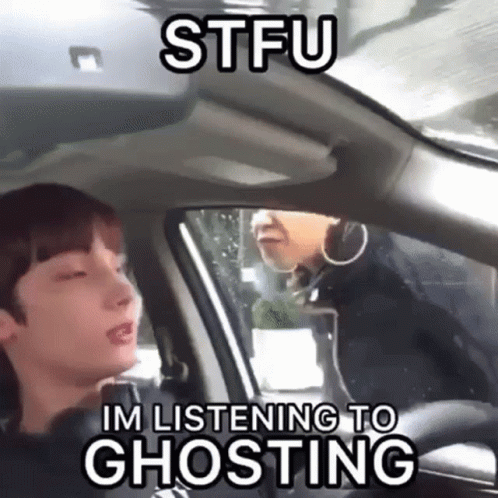 Man Sitting in Car With Woman Behind Him STFU Im Listening to Ghosting