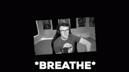 Man Sitting In Chair Black And White Breathe GIF