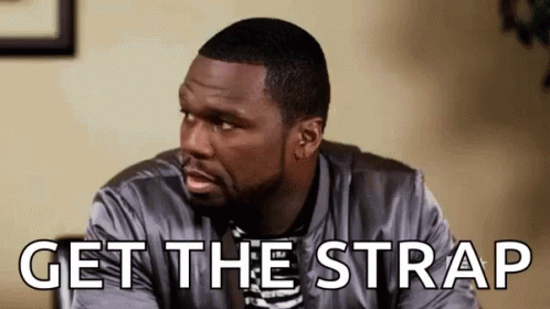 Man Sitting in Chair Saying Get the Strap