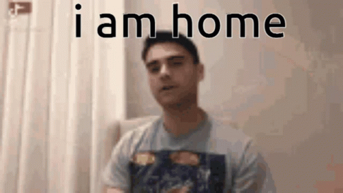 Man Sitting in Chair Saying I Am Home
