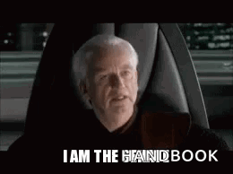Man Sitting In Chair Saying I Am The Handbook GIF