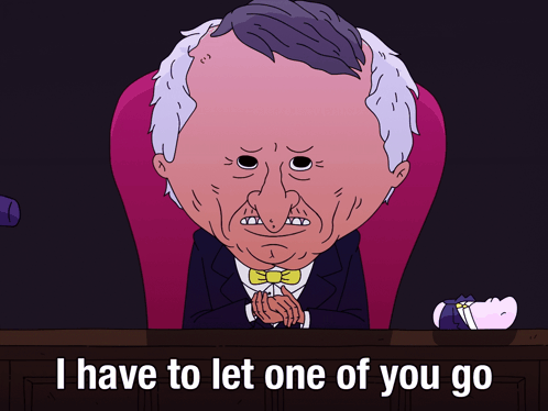 Man Sitting in Chair Saying I Have to Let One of You Go