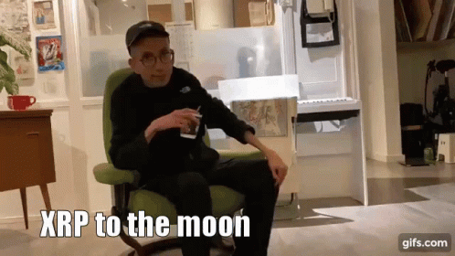 Man Sitting in Chair Saying XRP to the Moon