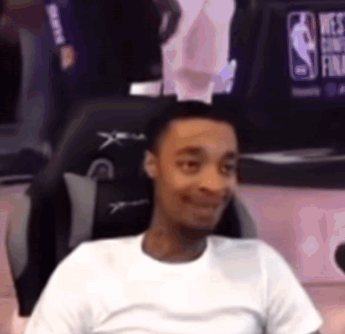 Man Sitting in Chair Smiling