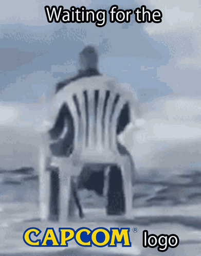Man Sitting in Chair With Capcom Logo