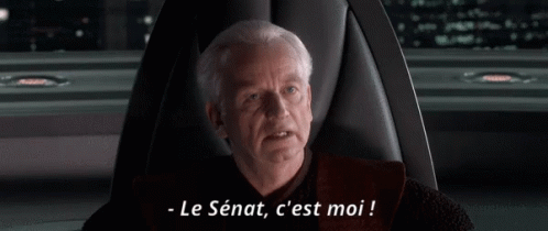 Man Sitting In Chair With Le Senat C'est Moi GIF