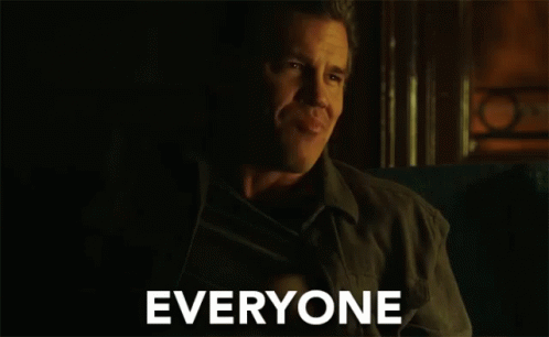 Man Sitting in Dark Room Saying Everyone
