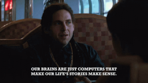 Man Sitting in Diner With Quote About Brains