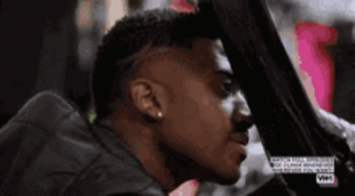 Man Sitting in Driver's Seat