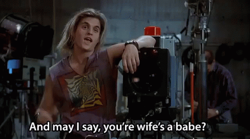 Man Sitting in Front of Camera Saying Wife's a Babe