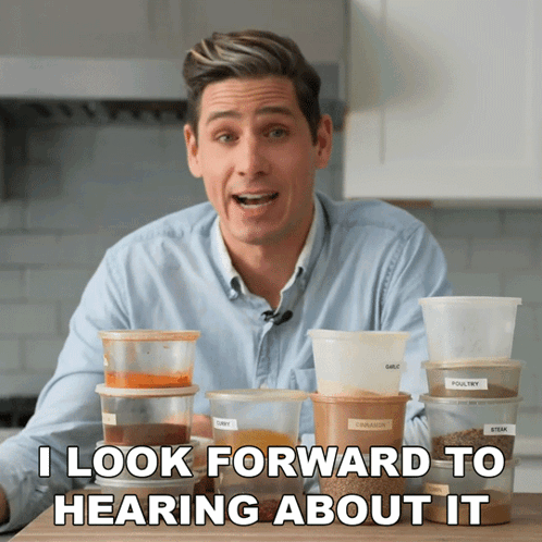 Man Sitting In Front Of Containers I Look Forward To Hearing About It GIF