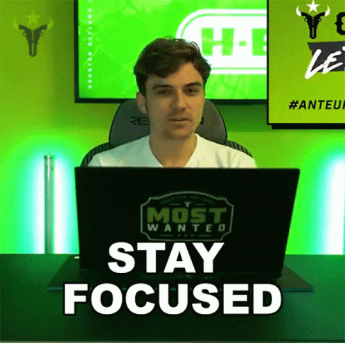 Man Sitting in Front of Laptop Saying Most Wanted