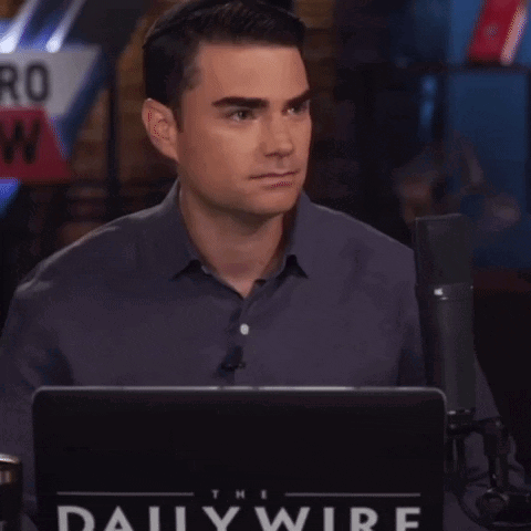 Man Sitting In Front Of Laptop With Daily Wire GIF