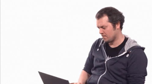 Man Sitting in Front of Laptop With Three Stars