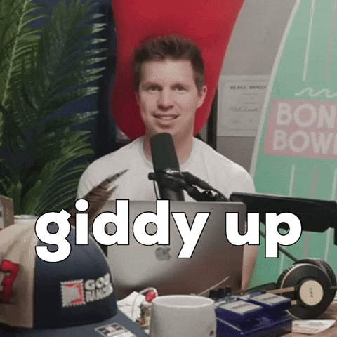 Man Sitting in Front of Microphone Giddy Up