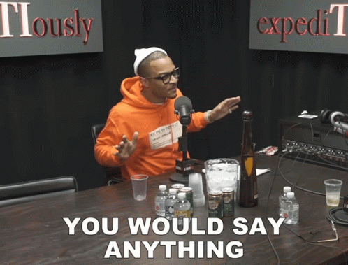 Man Sitting In Front Of Microphone Saying Anything GIF