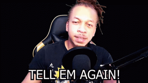 Man Sitting in Front of Microphone Tell Em Again