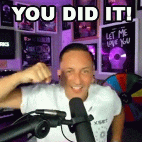 Man Sitting in Front of Microphone You Did It