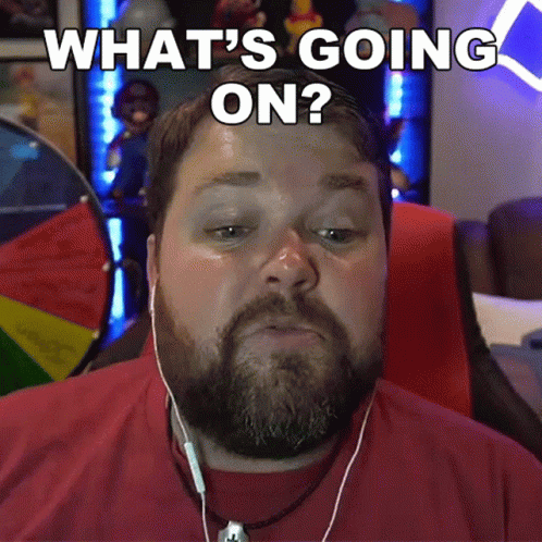 Man Sitting in Front of Netflix Sign