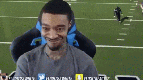 Man Sitting in Front of Screen Saying Flight23white